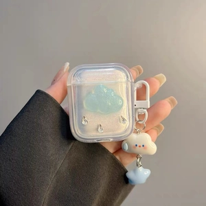 Close-up of pearlized clear case for Airpods 4 with 3D blue clouds and star charms