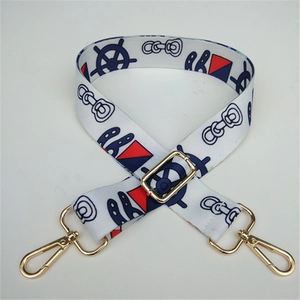 Adjustable nautical style handbag strap with navy anchor print and gold lobster clasps