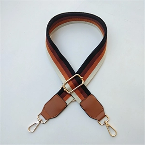 Adjustable wide woven guitar style strap for crossbody bags with brown PU leather