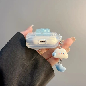 Detail view of transparent glitter AirPods case with cute blue bear and cloud charm