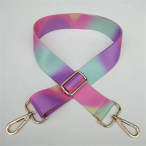 Adjustable bag strap with pink purple teal gradient and gold metal lobster clasps