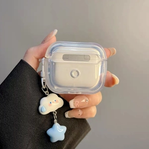 Close-up of clear glitter AirPods case featuring a cute blue star and cloud charm