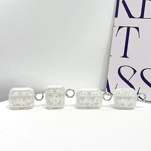 Custodia AirPods Pro glitterata con fiocco d'argento, perle e anello portachiavi