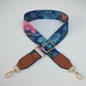 Tracolla larga regolabile blu navy con motivo floreale e ganci in metallo oro