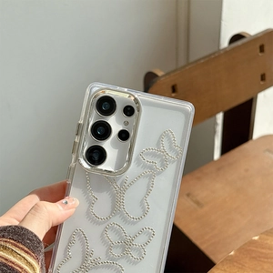 Macro shot of silver beaded butterfly design on clear Samsung S24 Ultra phone case