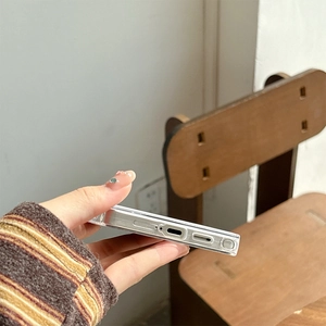 Detail shot of transparent phone case showing precise cutouts for USB-C and S-Pen ports