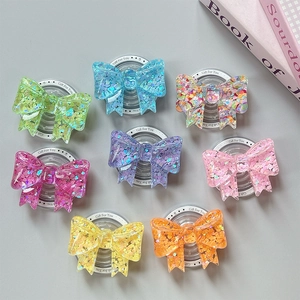 Sparkly glitter bow phone grip socket set with heart sequins in eight vibrant colors