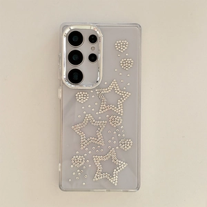 Detail of luxury rhinestone star and heart patterns on translucent Samsung Ultra case