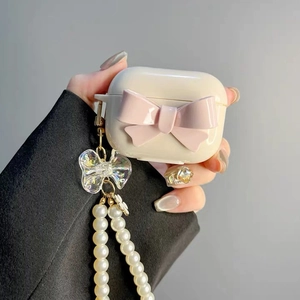 AirPods Pro case with large pink 3D bow and elegant pearl chain strap for women
