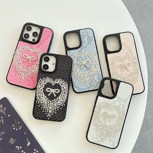 Chic rhinestone heart and bow snake-texture cases for iPhone 15/16/17 Pro Max models