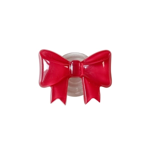 Solid red bow-shaped expanding cell phone grip with high-gloss finish and clear base