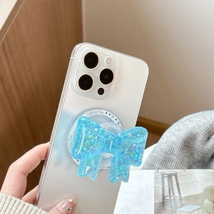 Sparkly blue glitter bow phone grip stand with heart sequins for mobile devices