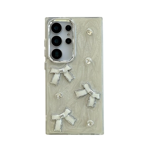 Sparkly rhinestone bow phone case for Samsung Galaxy S24 with pearlescent marble texture