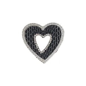 Luxury heart-shaped phone grip with black faux-crocodile leather and crystal rhinestones