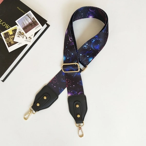 Adjustable crossbody strap with starry sky pattern and golden metal swivel clasps