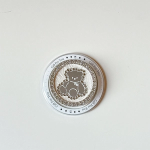 Macro detail of magnetic phone grip with rhinestone bear and Gift For You text