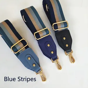 Adjustable wide striped shoulder straps with gold hooks for crossbody handbags