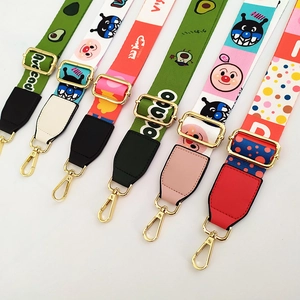 Adjustable wide replacement bag straps with various colorful patterns and gold metal clips