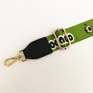 Adjustable green shoulder strap replacement with avocado patterns and gold metal clips