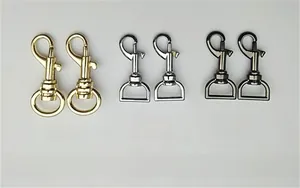 Close-up of gold silver and gunmetal lobster clasps for adjustable shoulder straps