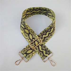 Adjustable yellow snakeskin print shoulder strap with gold-tone hardware for handbags