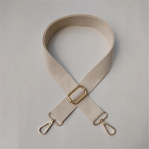 Adjustable beige cotton canvas shoulder strap with gold metal hooks for handbags