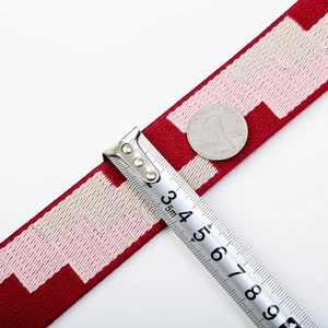 Detailed view of 4cm wide colorful geometric pattern strap with measurement reference