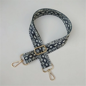 Adjustable snake print nylon shoulder strap for crossbody bags with gold hardware