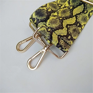 Adjustable yellow snakeskin pattern shoulder strap with premium gold metal lobster clasps