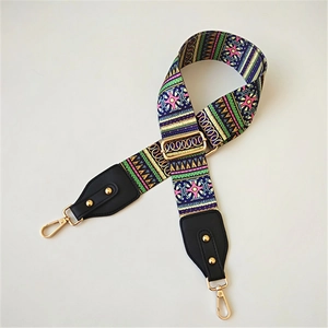 Ethnic geometric pattern wide bag strap with leather ends and golden metal clips