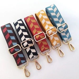 Adjustable woven jacquard bag strap replacement with gold hooks and wavy patterns