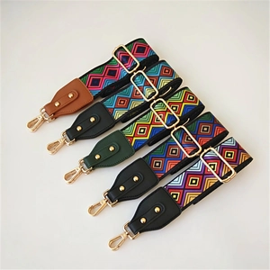 Ethnic geometric woven wide shoulder straps for handbags with gold-tone hardware detail