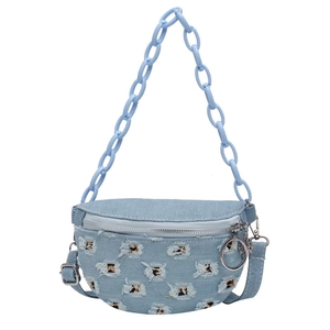 Distressed blue denim crossbody bag with leopard print details and thick blue acrylic chain