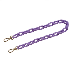 Purple acrylic chain strap for handbags with gold swivel metal hooks on white background