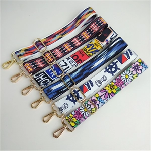 Ethnic style adjustable wide bag straps with colorful geometric patterns and gold metal hooks