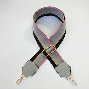 Adjustable woven strap with colorful stripes and gold-tone metal swivel hooks