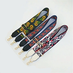 Adjustable wide straps with ethnic floral and geometric patterns and gold metal buckles