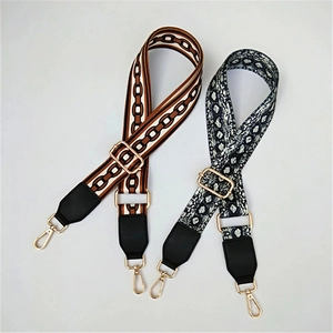 Adjustable crossbody bag straps with geometric chain and snakeskin patterns and gold hooks
