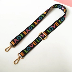 Adjustable black shoulder strap with colorful LOVE embroidery and gold hardware