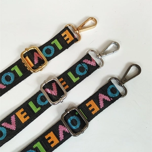 Adjustable black strap with colorful LOVE lettering and three hardware finish options