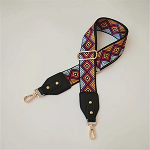 Adjustable woven shoulder strap with colorful geometric pattern and gold hardware
