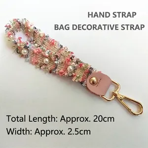 Pink and green tweed woven wristlet strap with pearls and gold metal clasp for bags