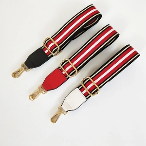 Ethnic style adjustable striped bag straps with gold metal hardware and leather trim