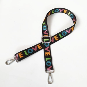 Adjustable black nylon bag strap with colorful LOVE lettering and silver metal hooks