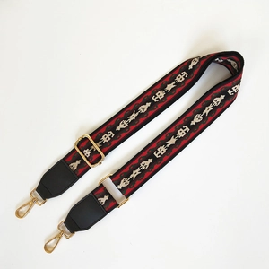 Adjustable ethnic style bag strap with red and green embroidery and gold metal clips
