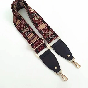Ethnic geometric pattern wide shoulder strap with red leather and gold lobster clips