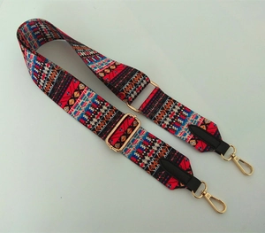 Bandoulière large réglable de style ethnique avec jacquard rouge et boucles dorées
