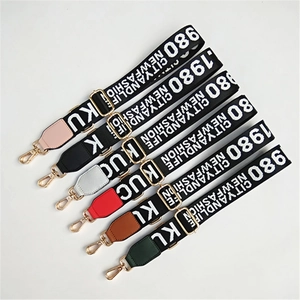 Detail of adjustable woven wide bag straps with leather ends in six different colors