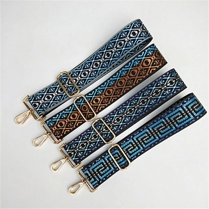 Adjustable wide shoulder straps with ethnic geometric patterns and gold metal hardware