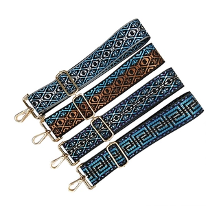 Adjustable ethnic style woven bag straps with colorful patterns and gold metal hooks